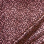 Polyester jacquard glanzend met roze kronkel patroon