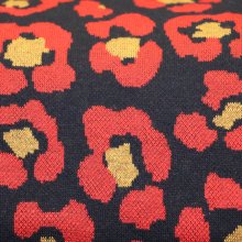 Jacquard tricot met rode pantervlekken