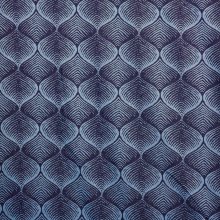 Jacquard tricot blauw met abstract patroon en lichte glinstering