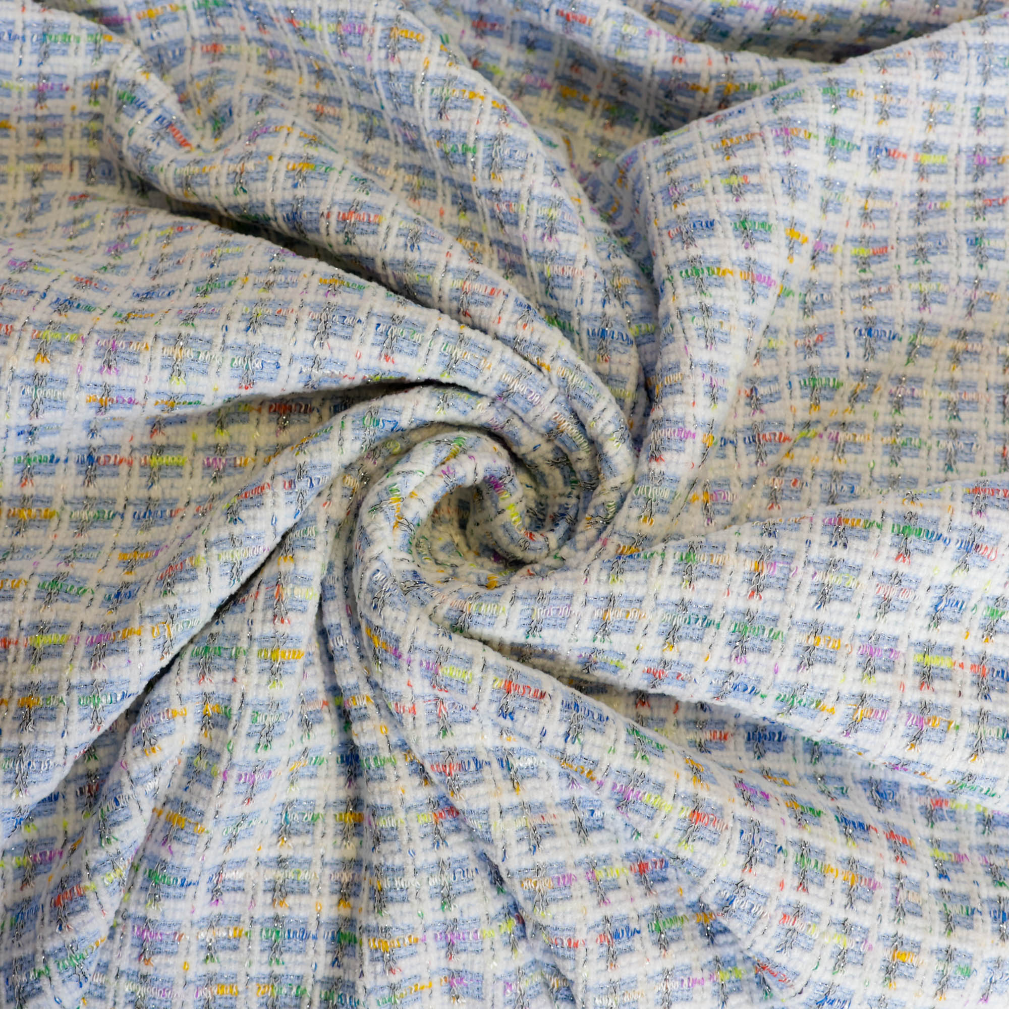 Tweed blauw met kleurenpatroon en lichte glinstering  - A La Ville