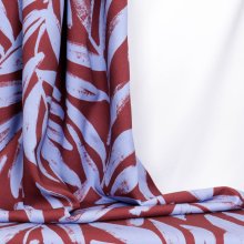 Viscose crêpe bruin met lichtblauw bloemenpatroon