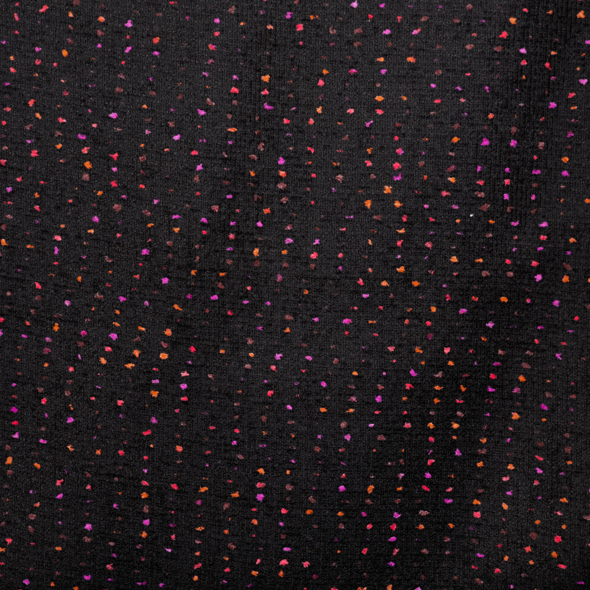 Bouclé zwart met roos/oranje stippen  - Lorré