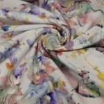 Katoentricot wit met waterverf patroon