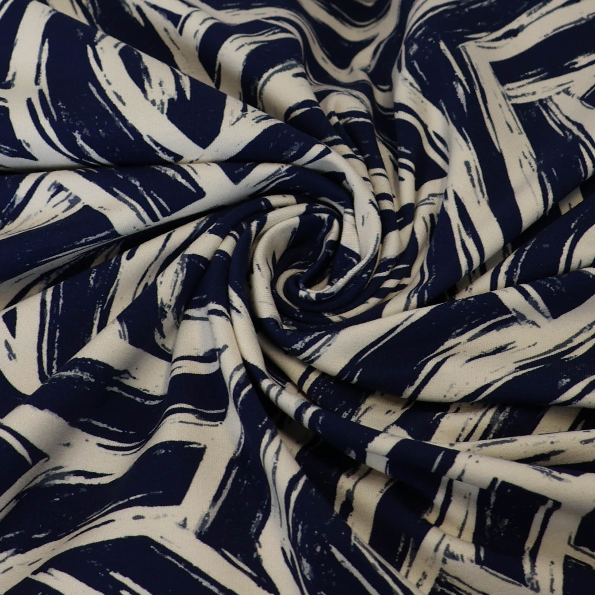 Katoentricot gebroken wit met donkberblauwe vegen