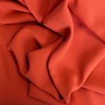 Lichte crêpe oranjerood