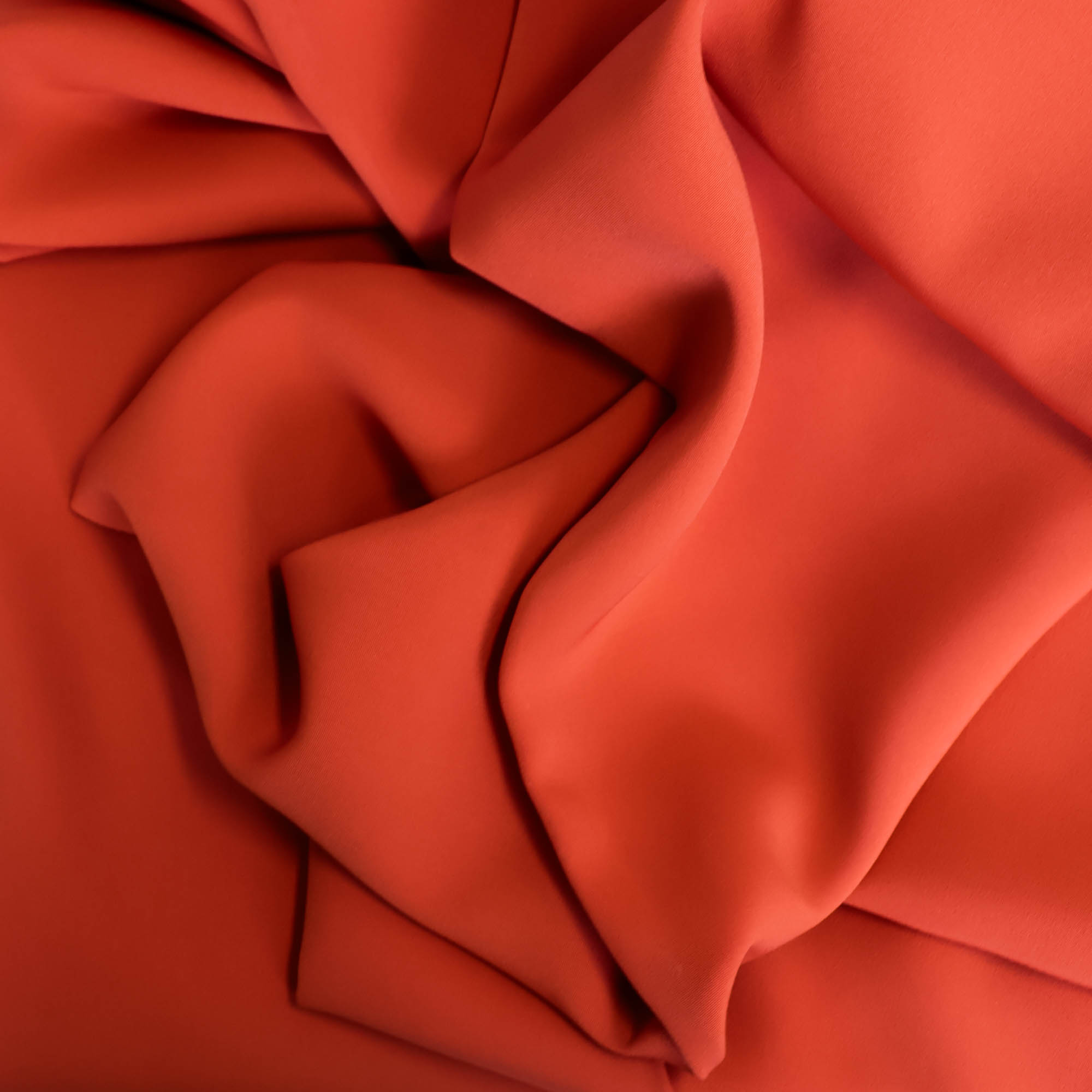 Lichte crêpe oranjerood