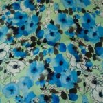 Polyester groen met blauwe bloemen - Lorré