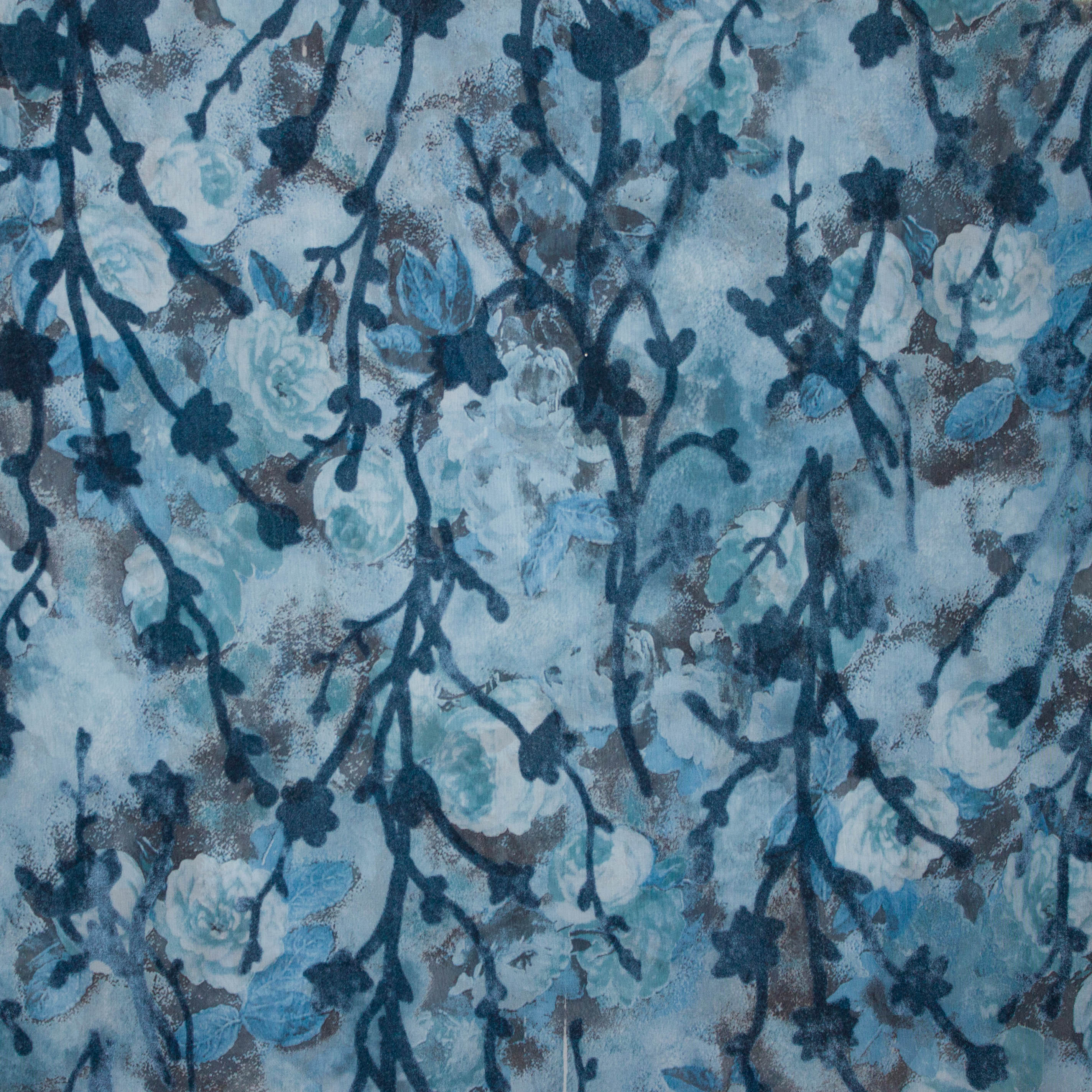Blauwe doorzichtige viscose met bloemen