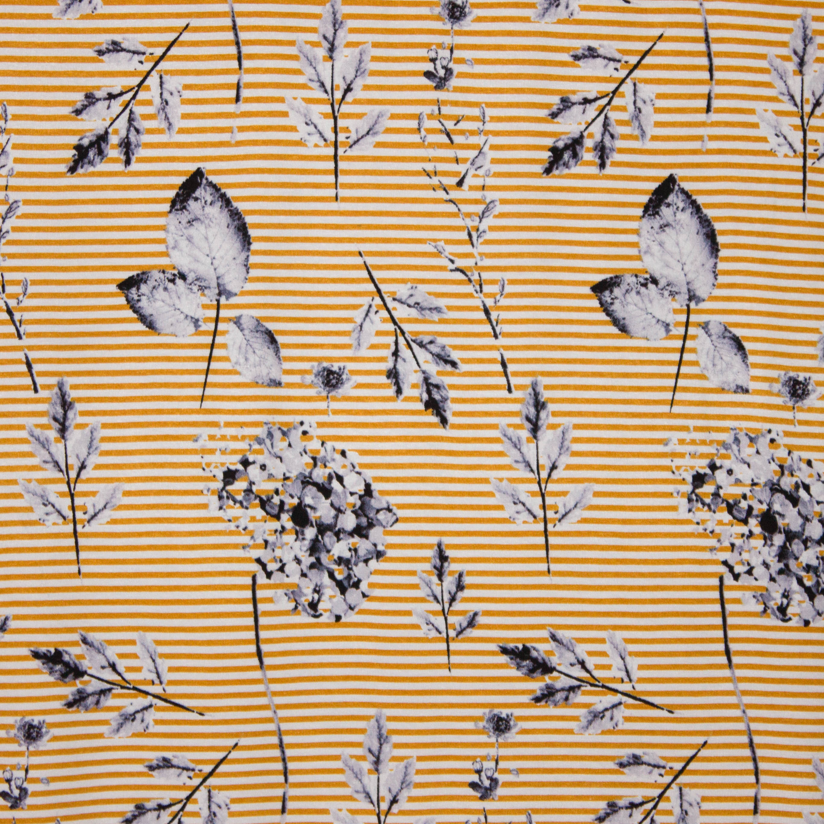 Gestreepte tricot in wit en okergeel met bloemen dessin van 'Stitched By You'