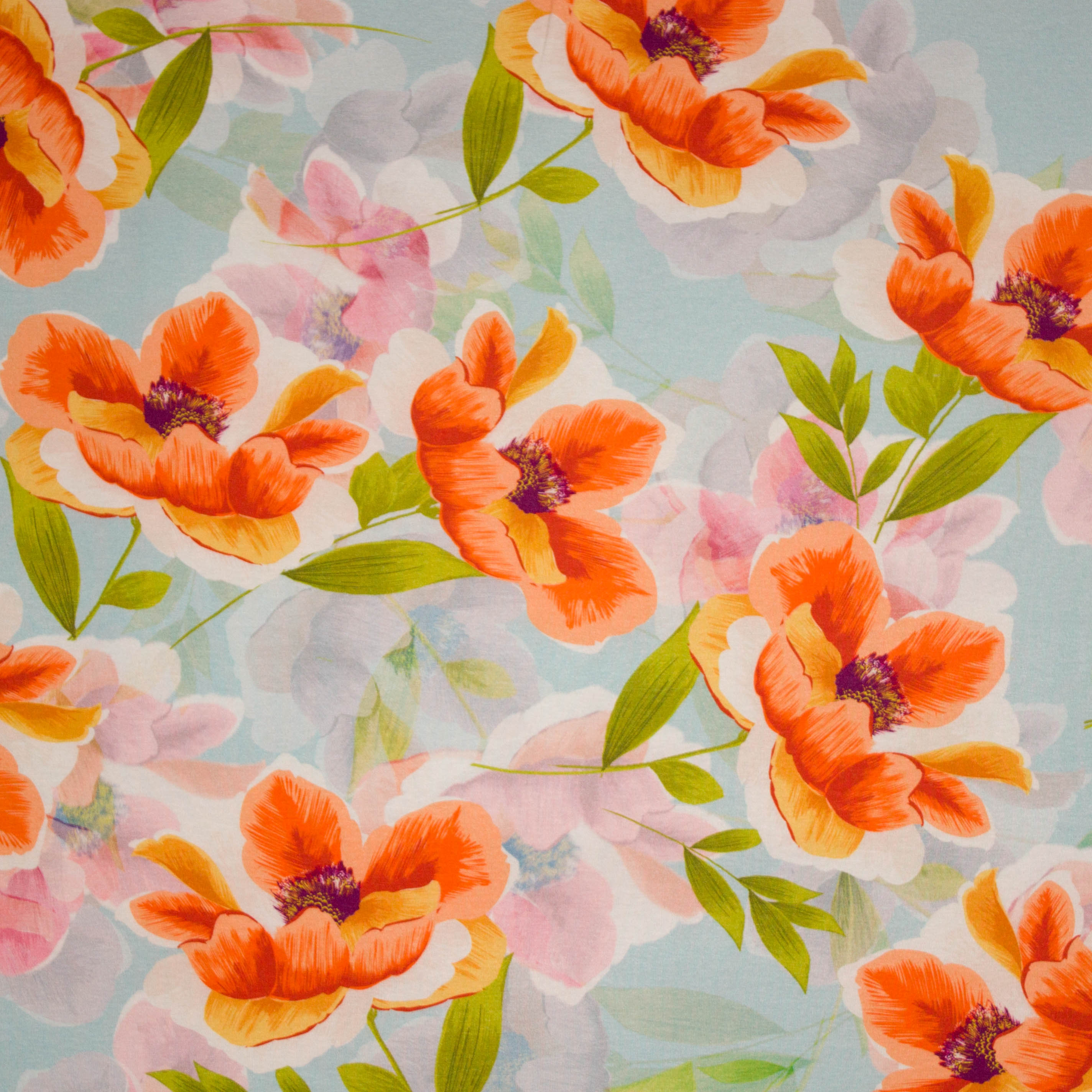 Lichtblauwe tricot met bloemenmotief