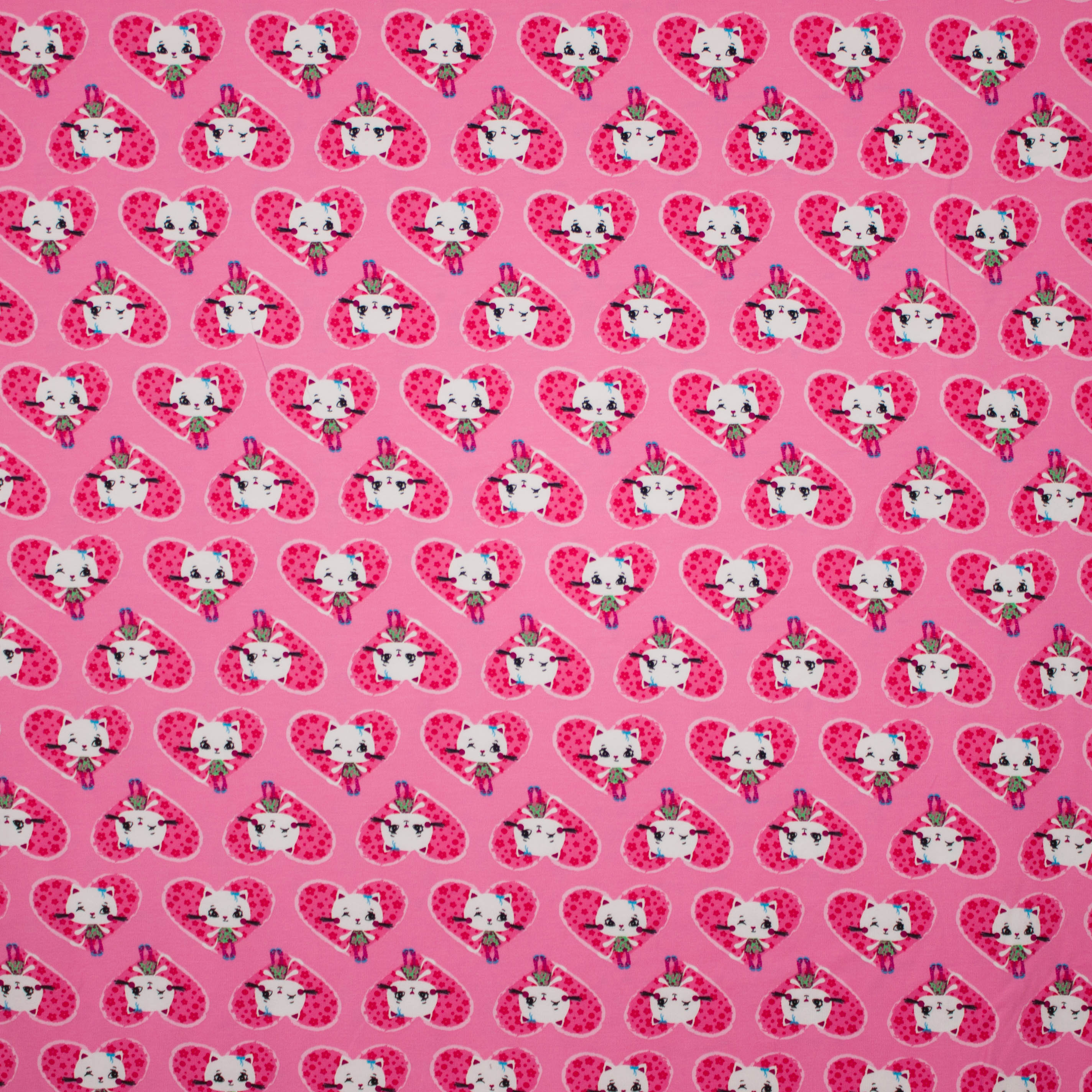 Roze tricot met harten en poesjes motief