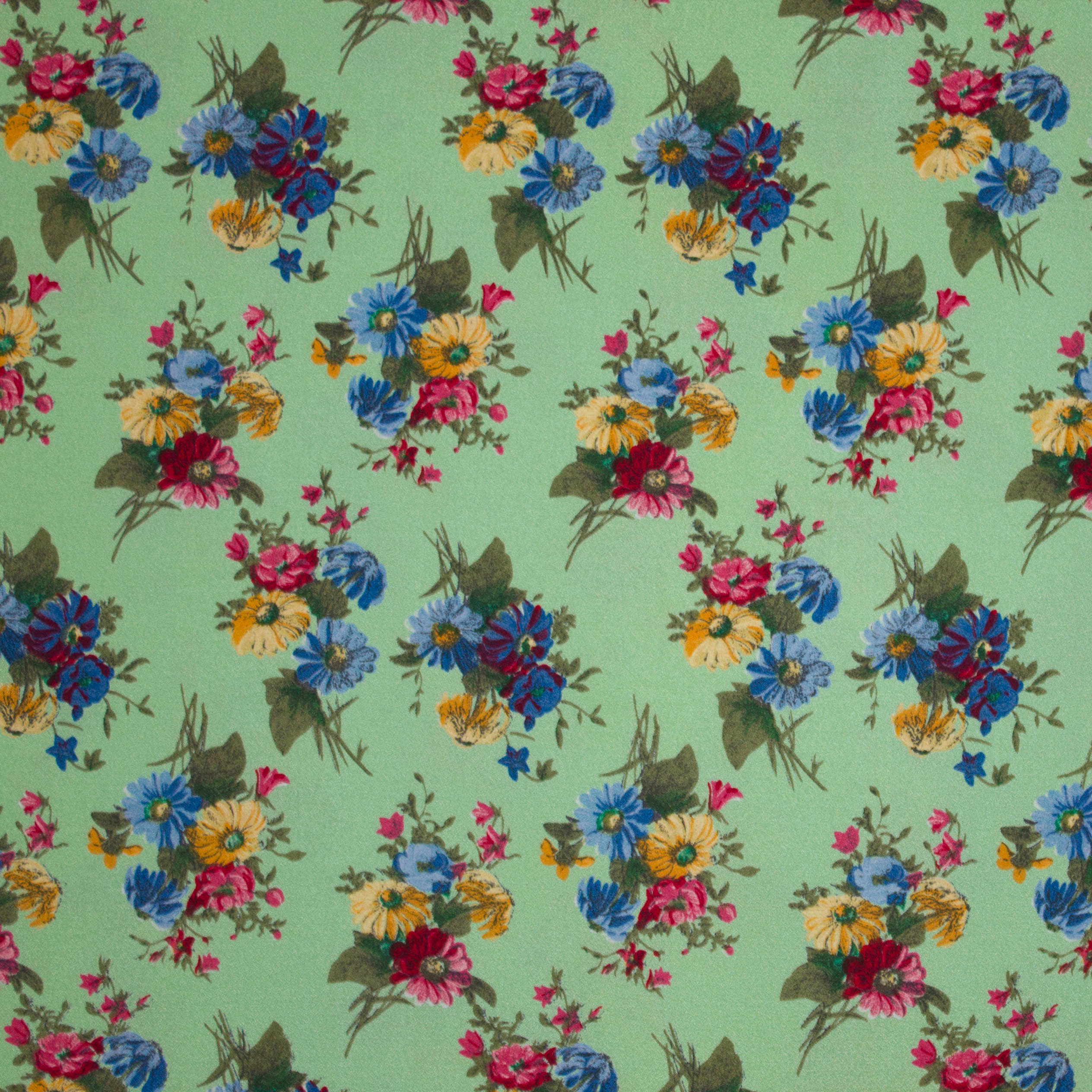 Lichtgroene polyester met bloemen motief