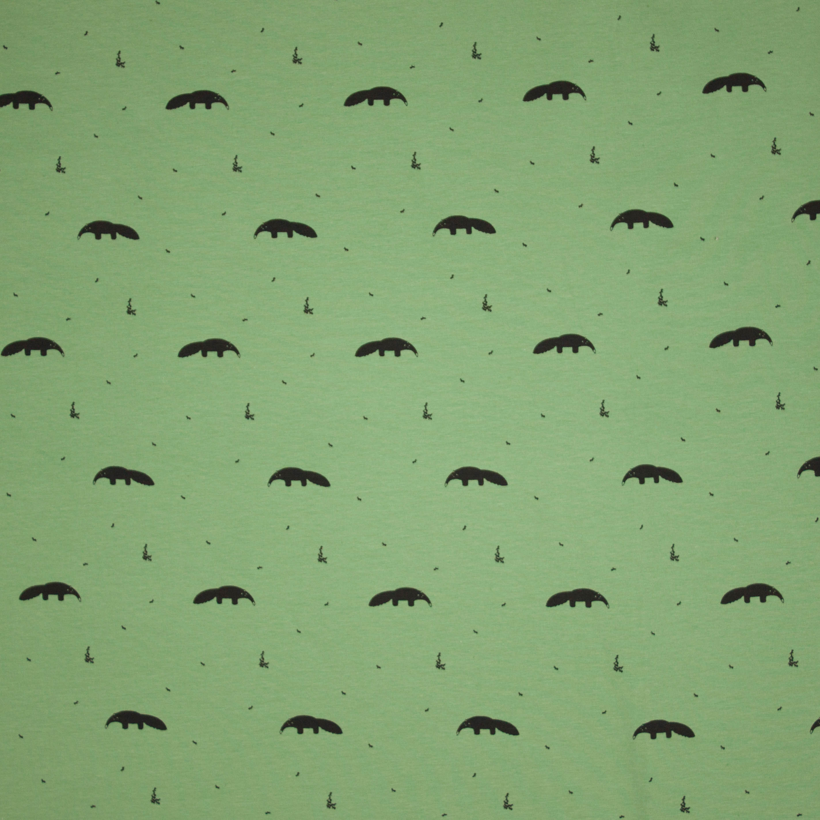 Organische tricot groen met abstracte zwarte diertjes van 'Froy en Dind'