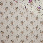Kleur veranderende tricot met popjesmotief