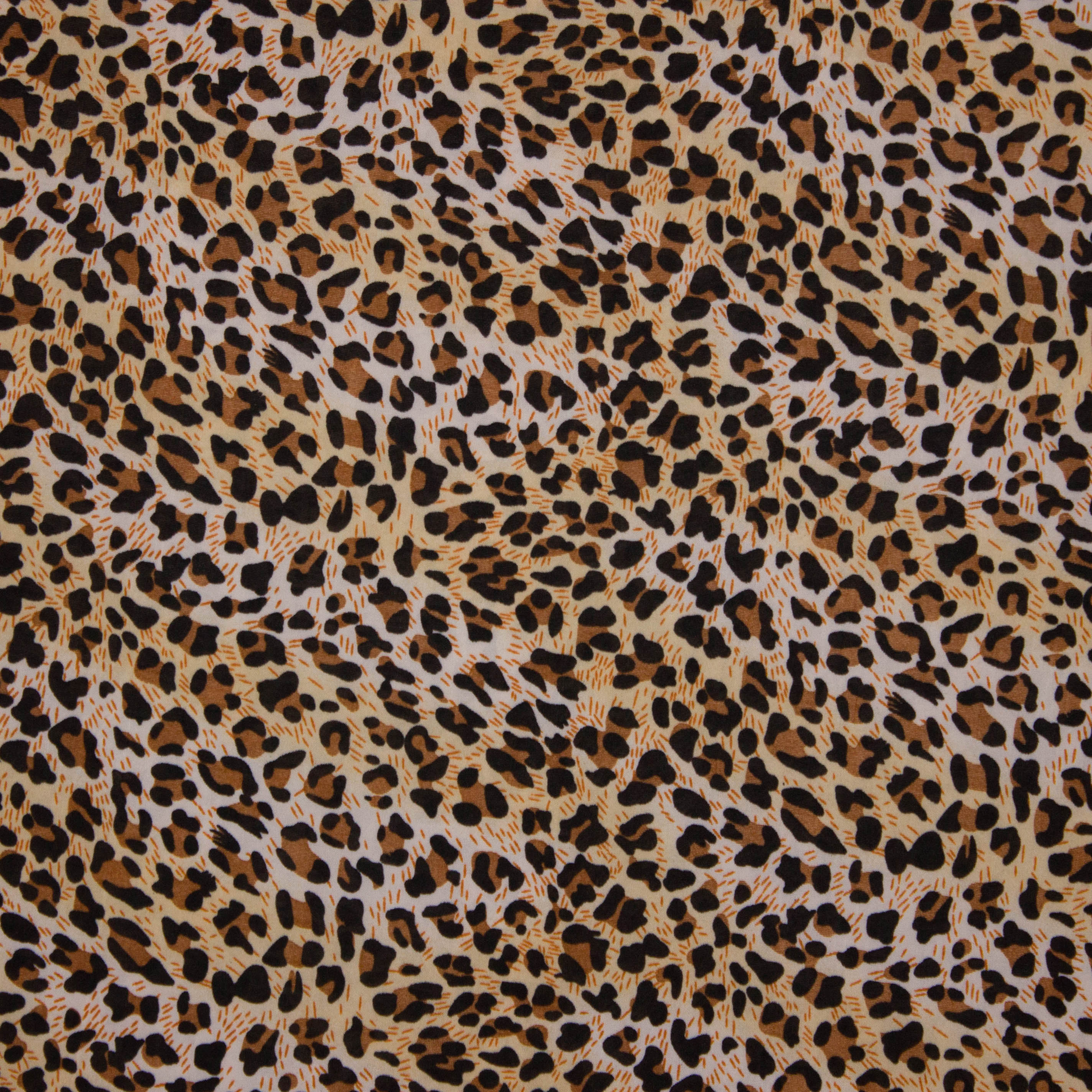Polyester stretch met pantervlekken