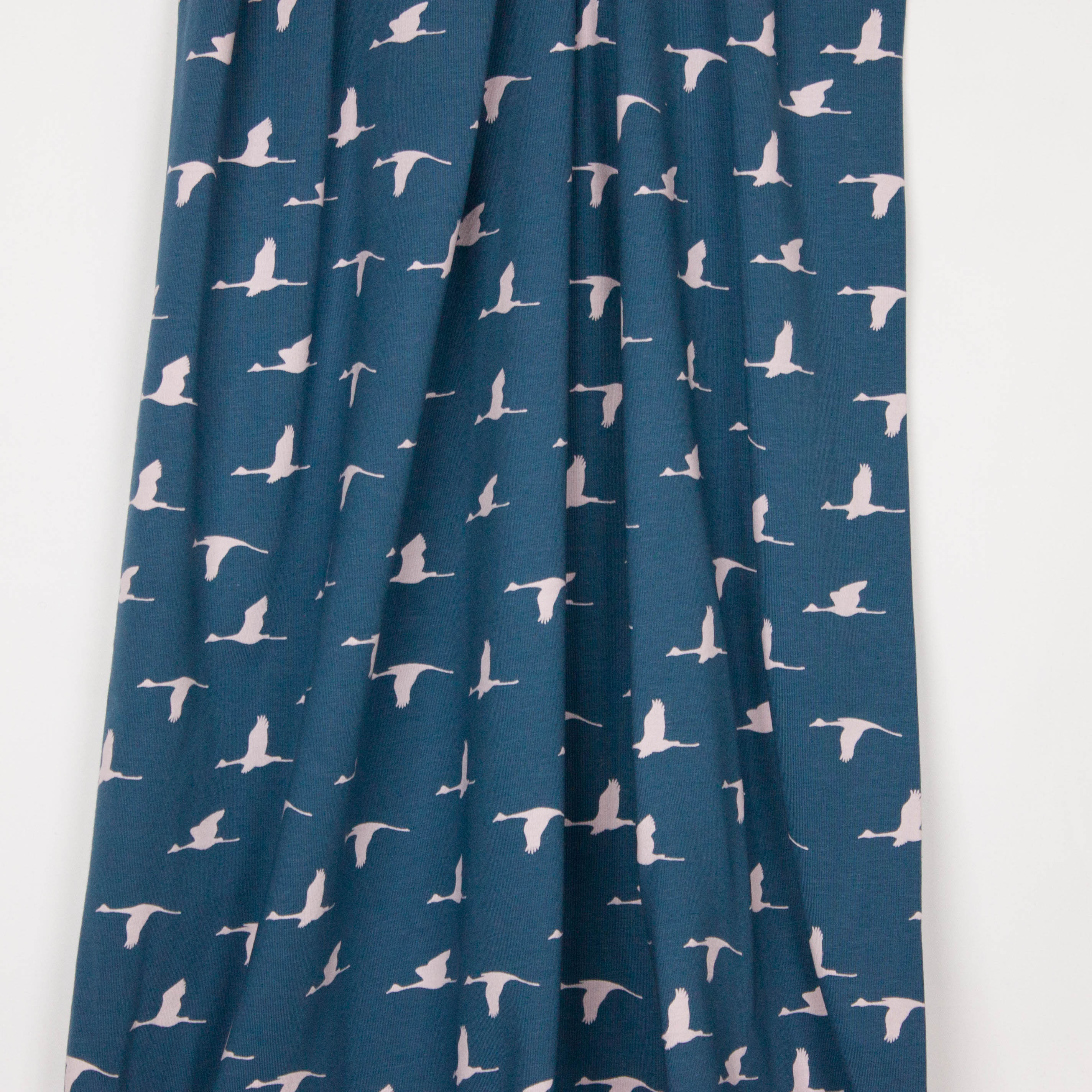 Blauwe tricot met roze ibissen