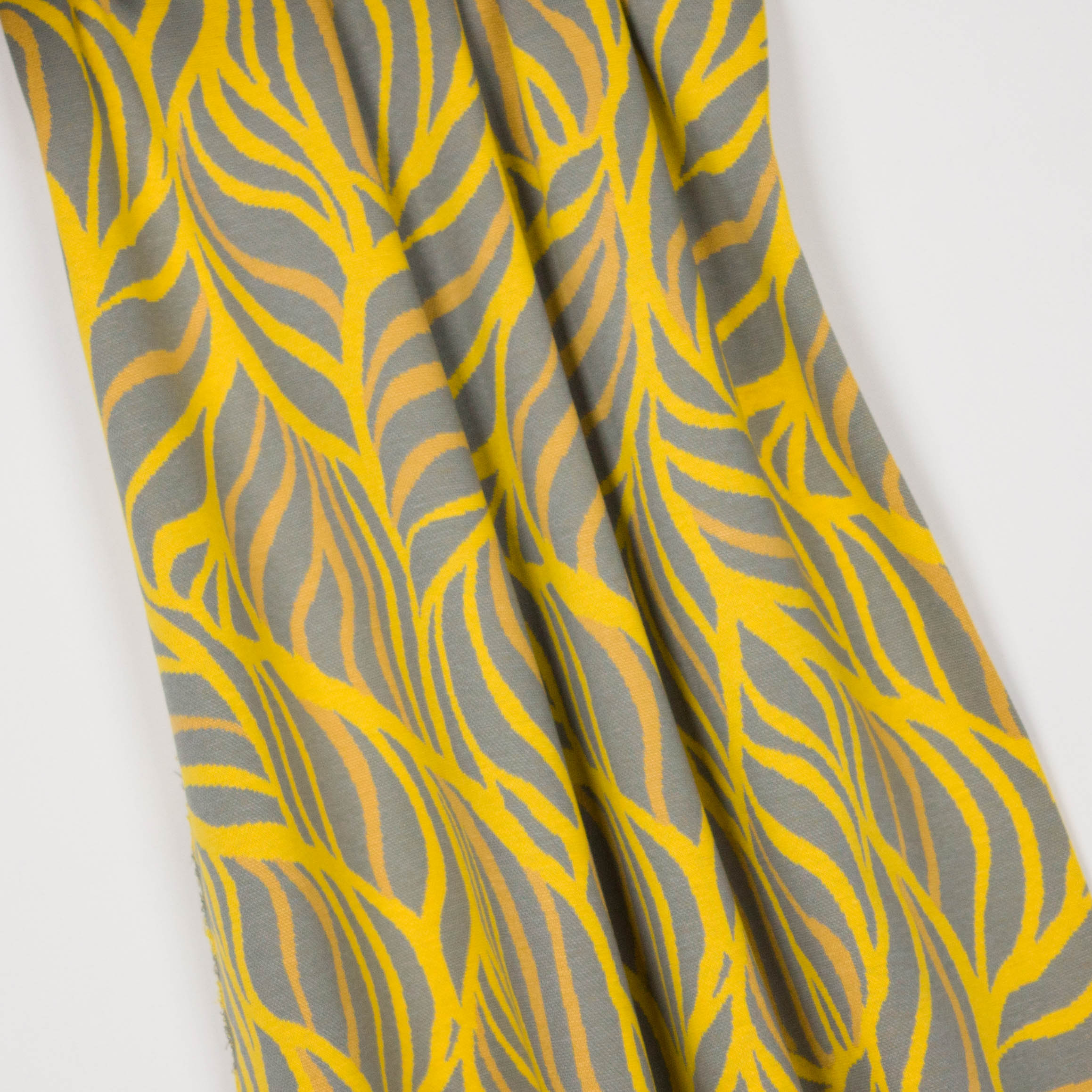 Rekbare jacquard met bladmotief