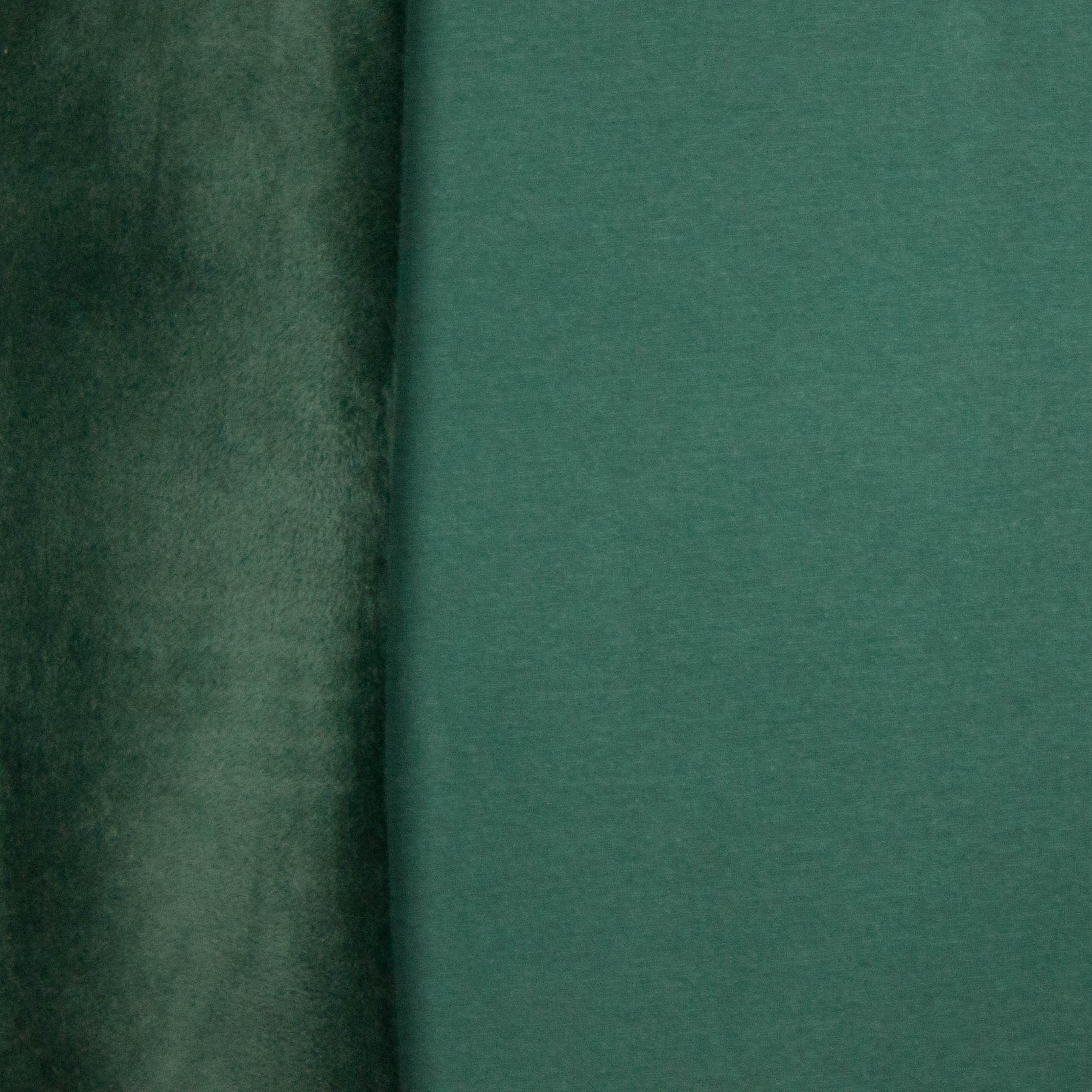 Groene sweaterstof met aan de achterkant een pelsje