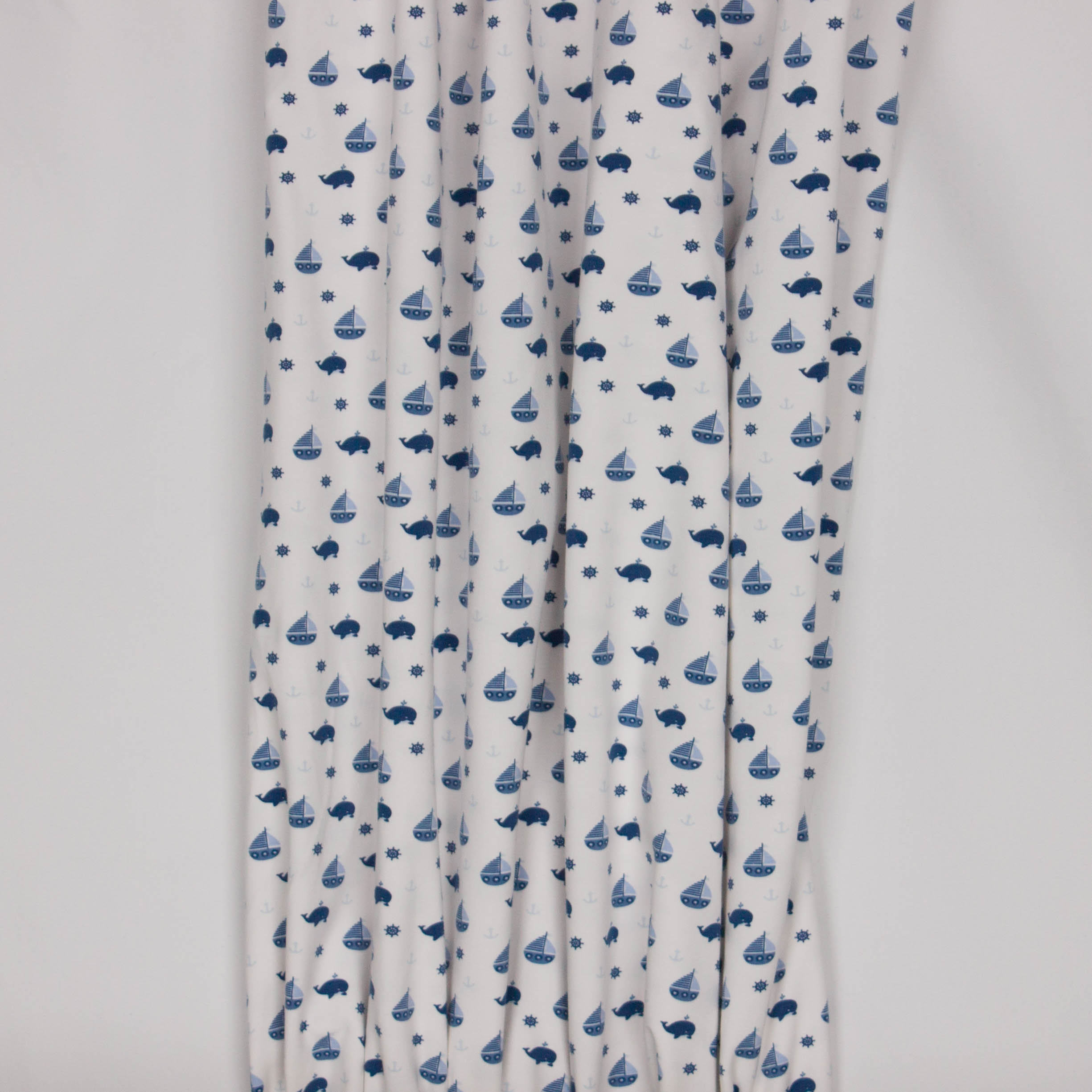 Witte tricot met blauwe 'zee' motieven