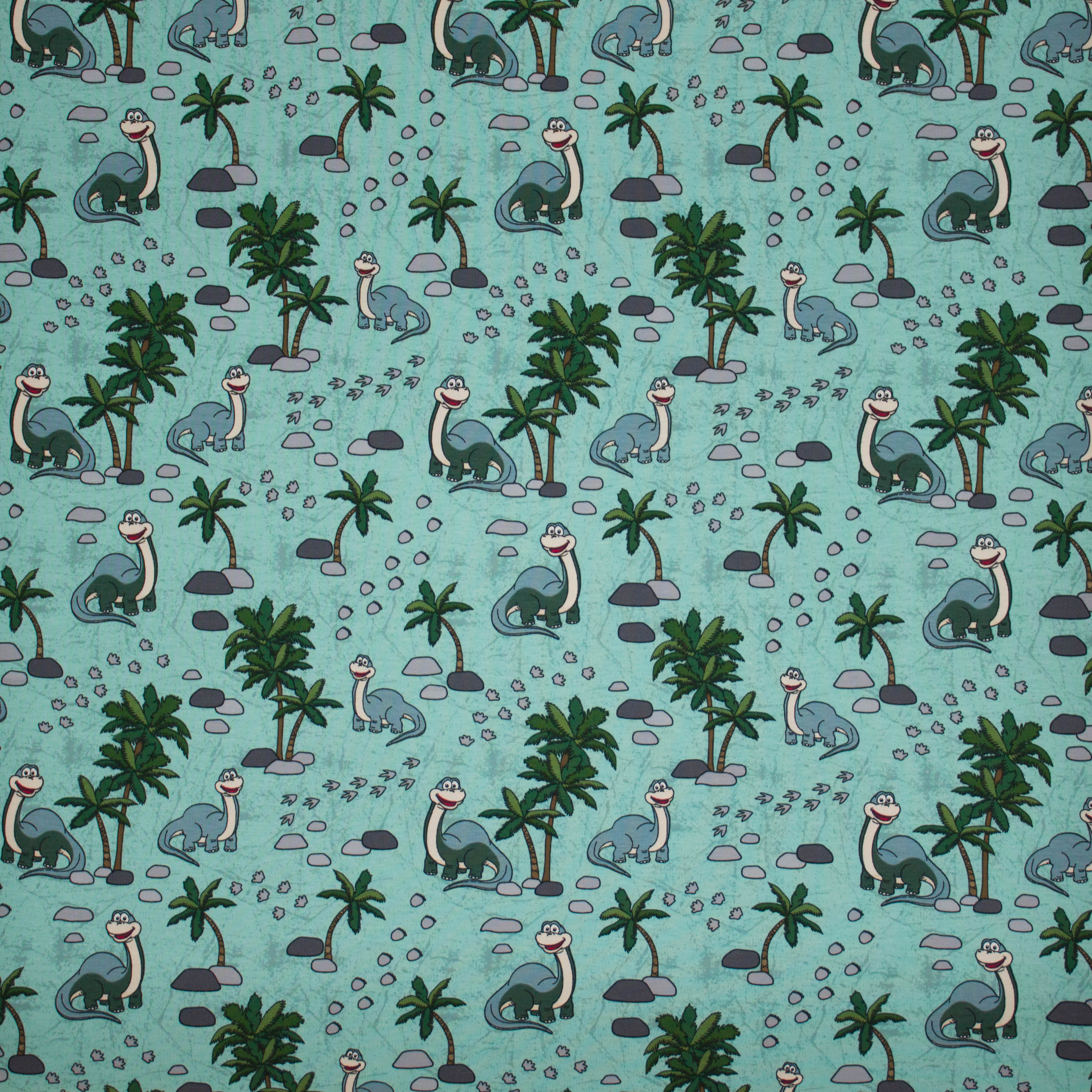 Munt tricot met dino's en palmbomen