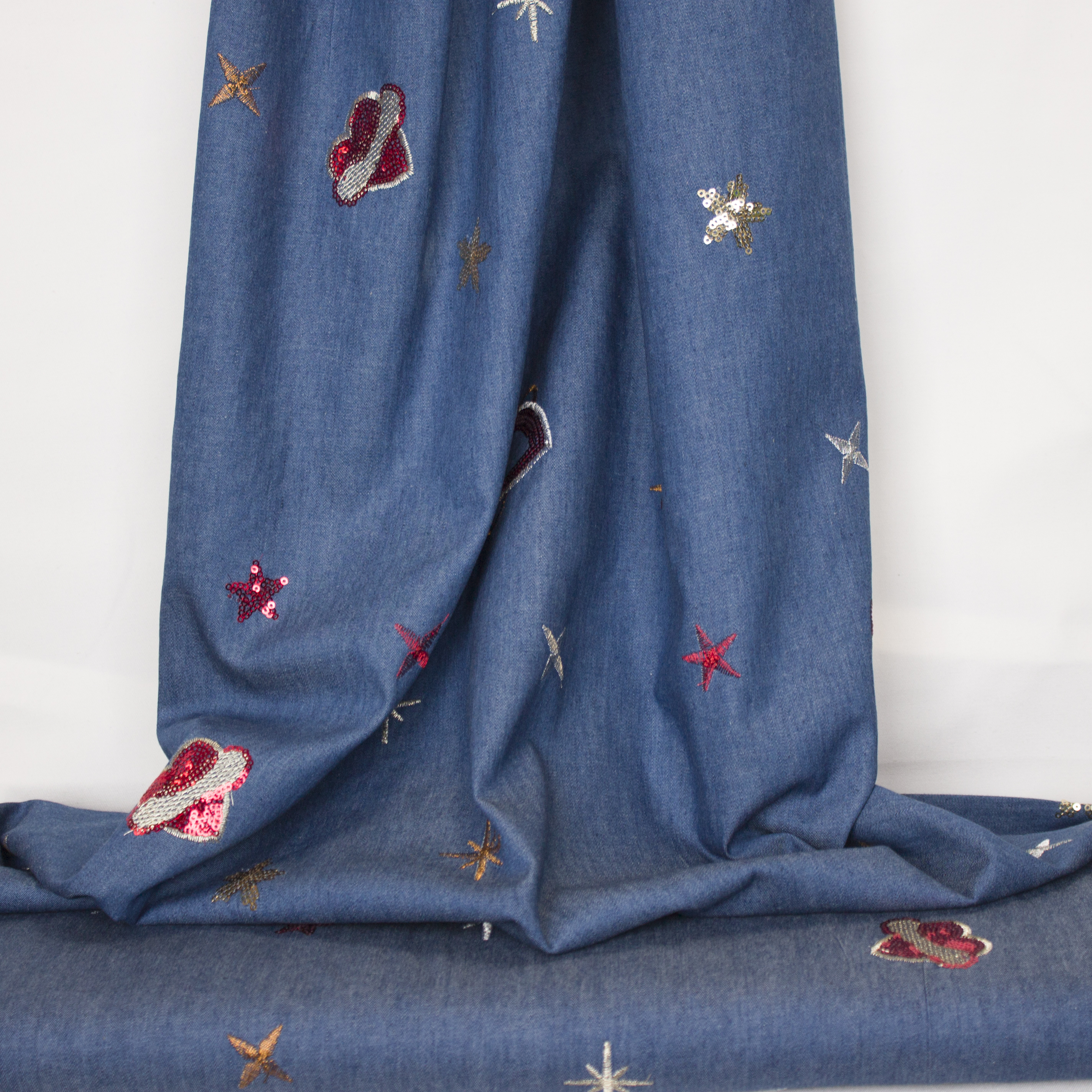 Blauwe jeans met glitter elementen
