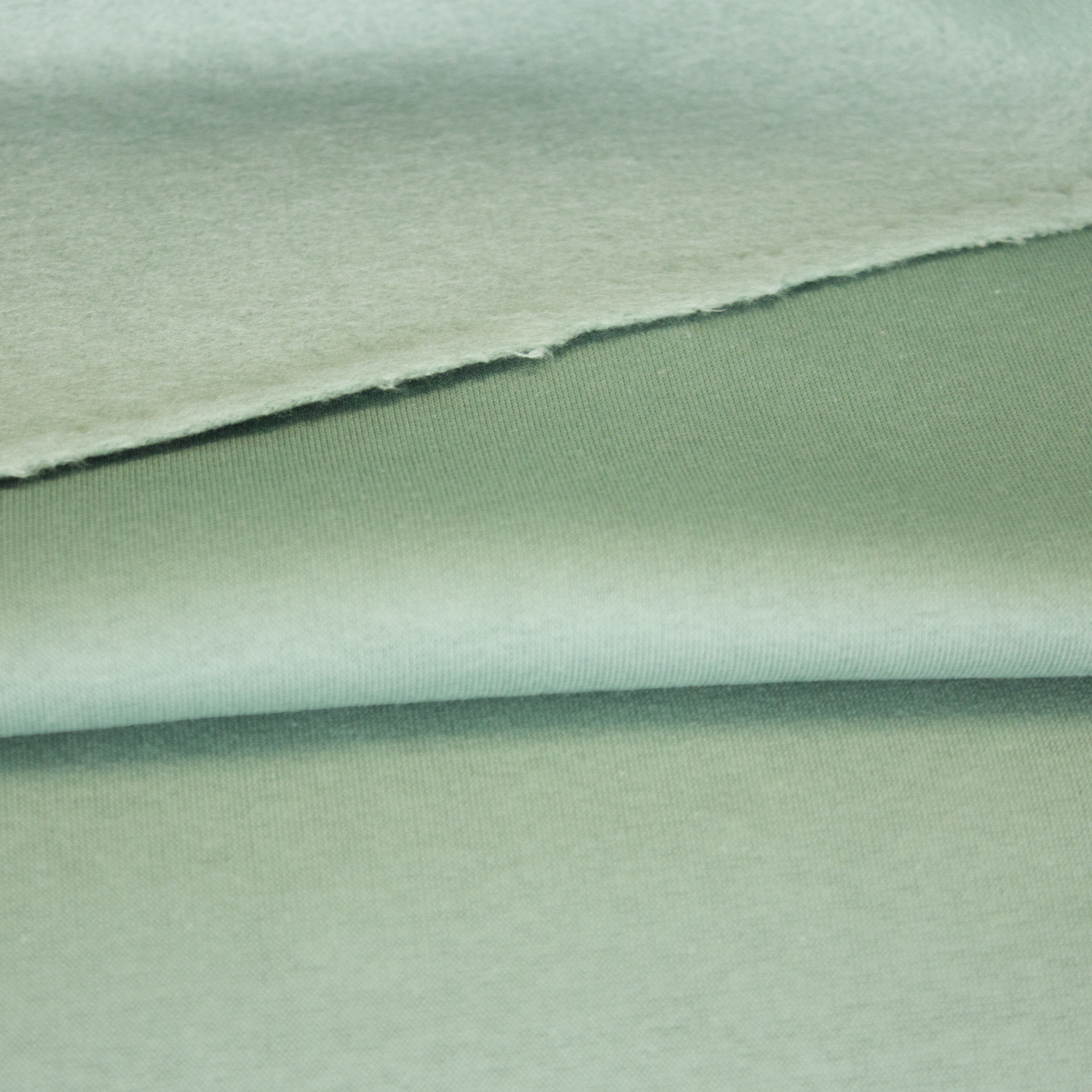 Groene sweaterstof met gewatteerde achterkant van Fibre Mood