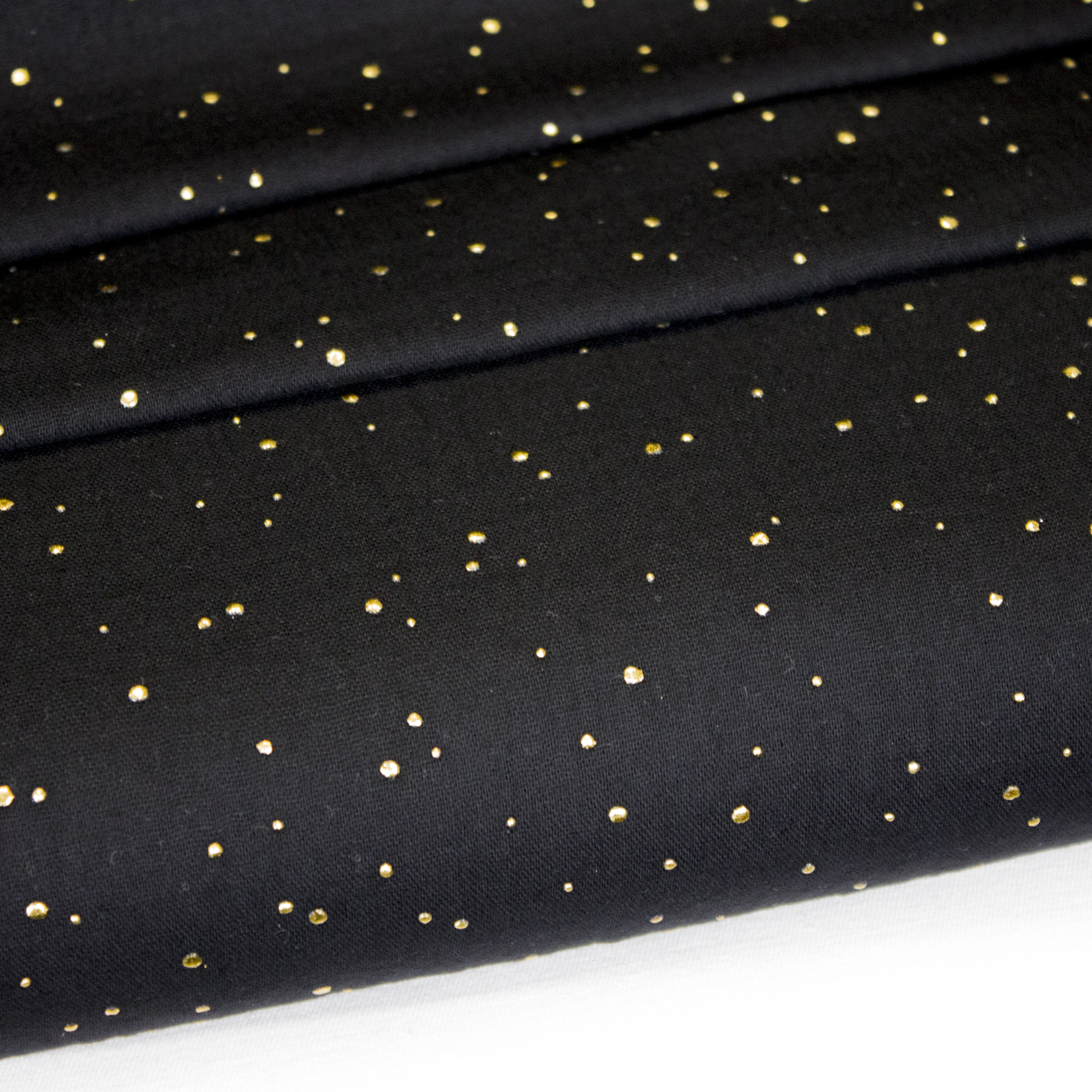 Zwarte double gauze met gouden spikkels