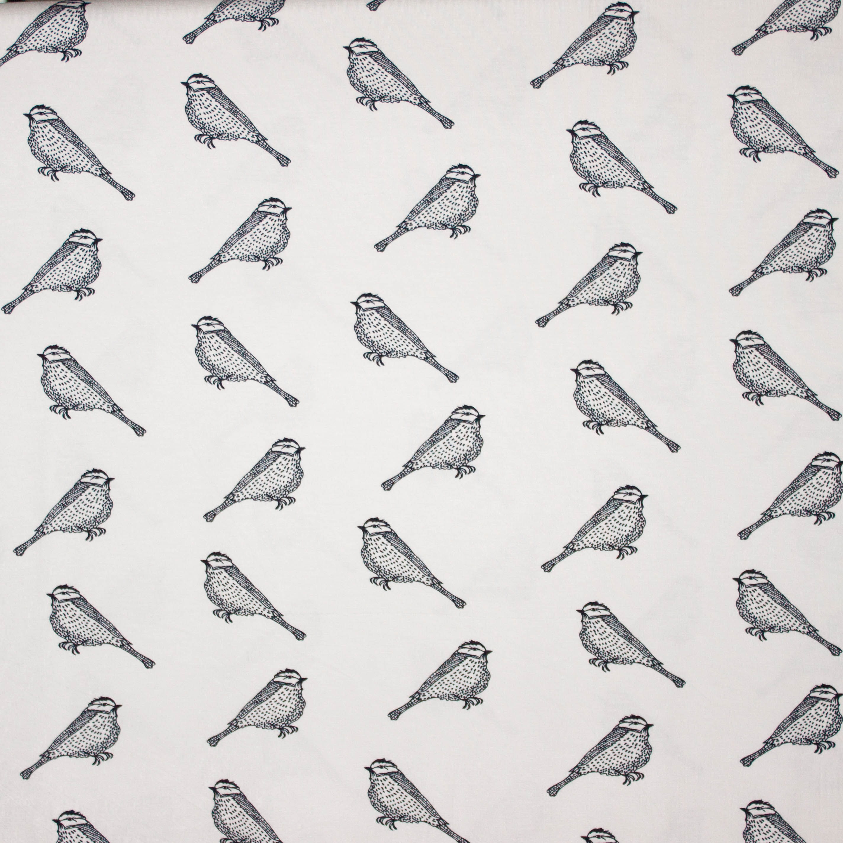 Witte viscosetricot met zwarte vogels