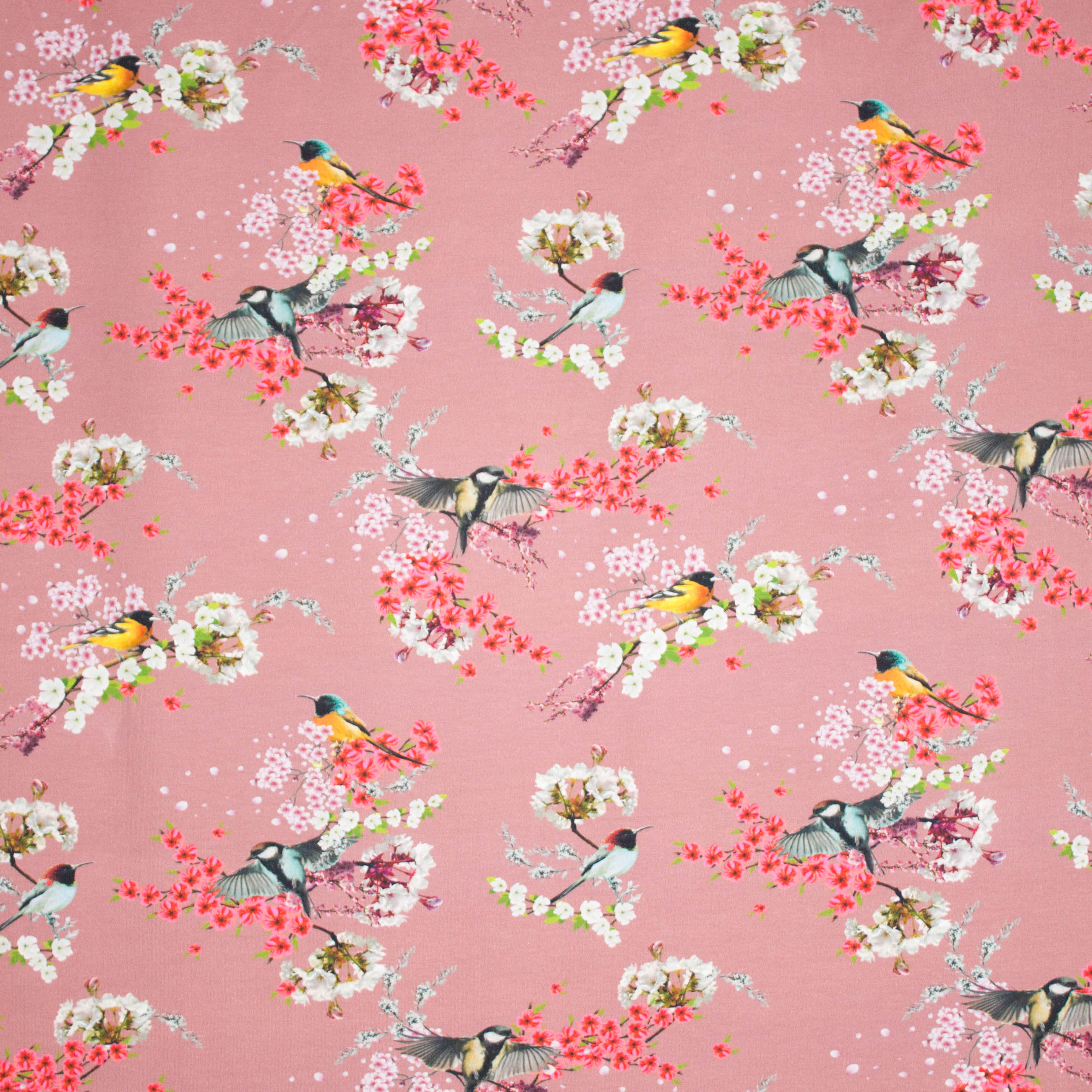 Oudroze tricot met bloemen en vogels motief van 'Megan Blue Fabrics'