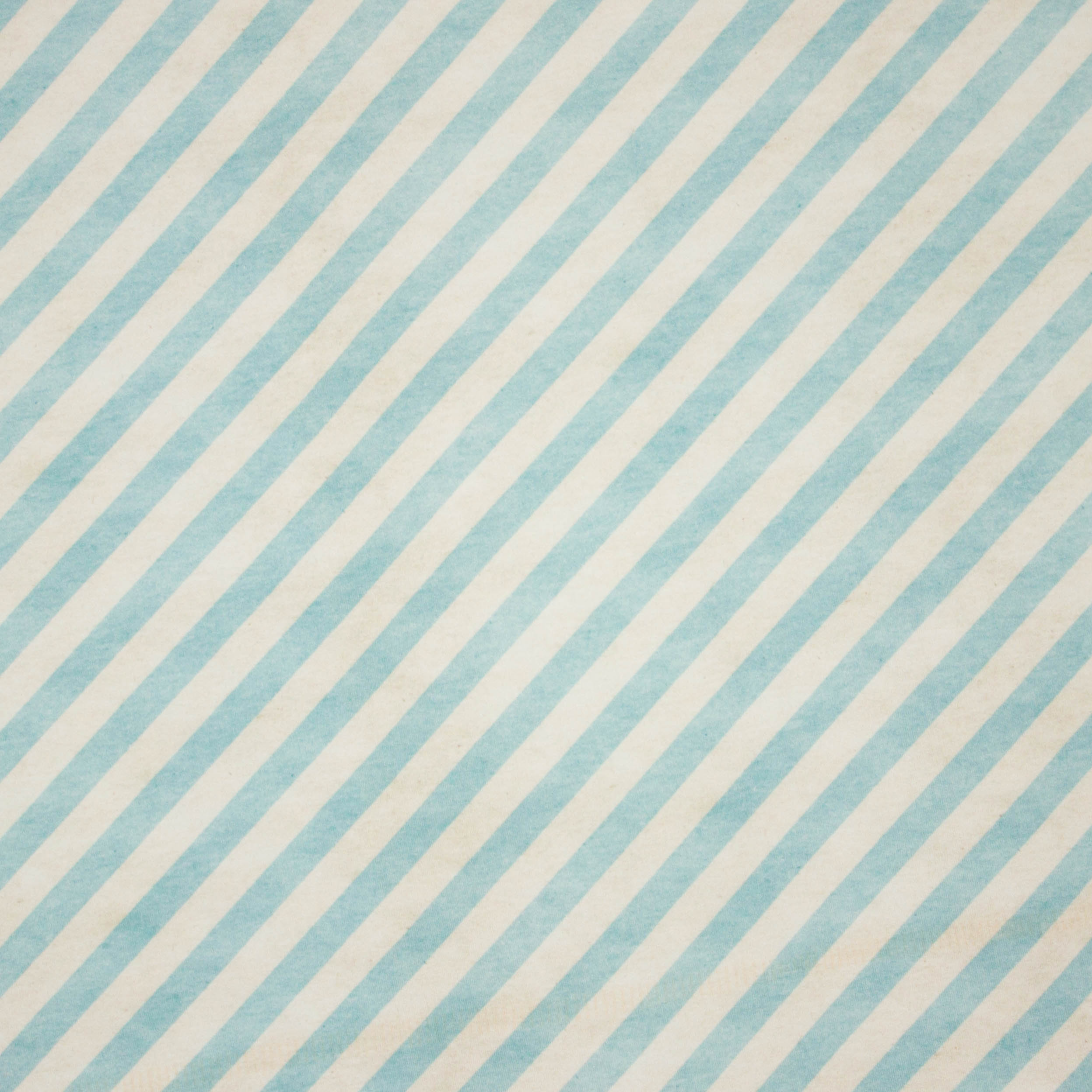 French terry met turquoise en ecru diagonale strepen van 'About Blue Fabrics'