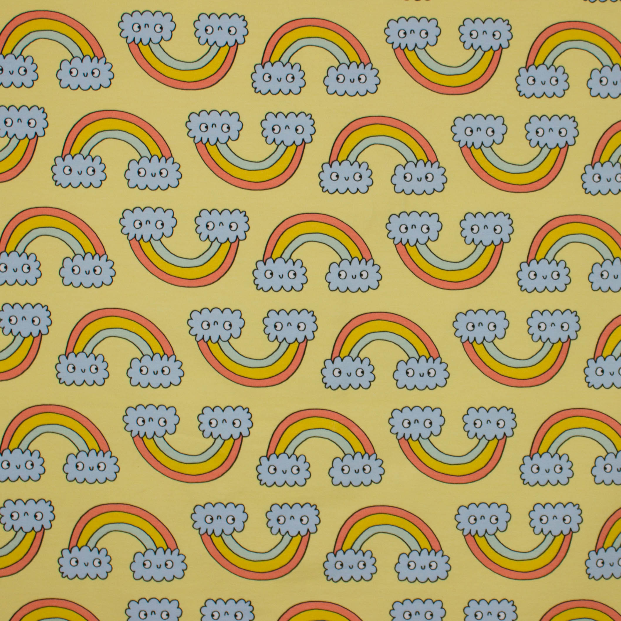 Gele french terry met regenbogen en wolkjes van Eva Mouton