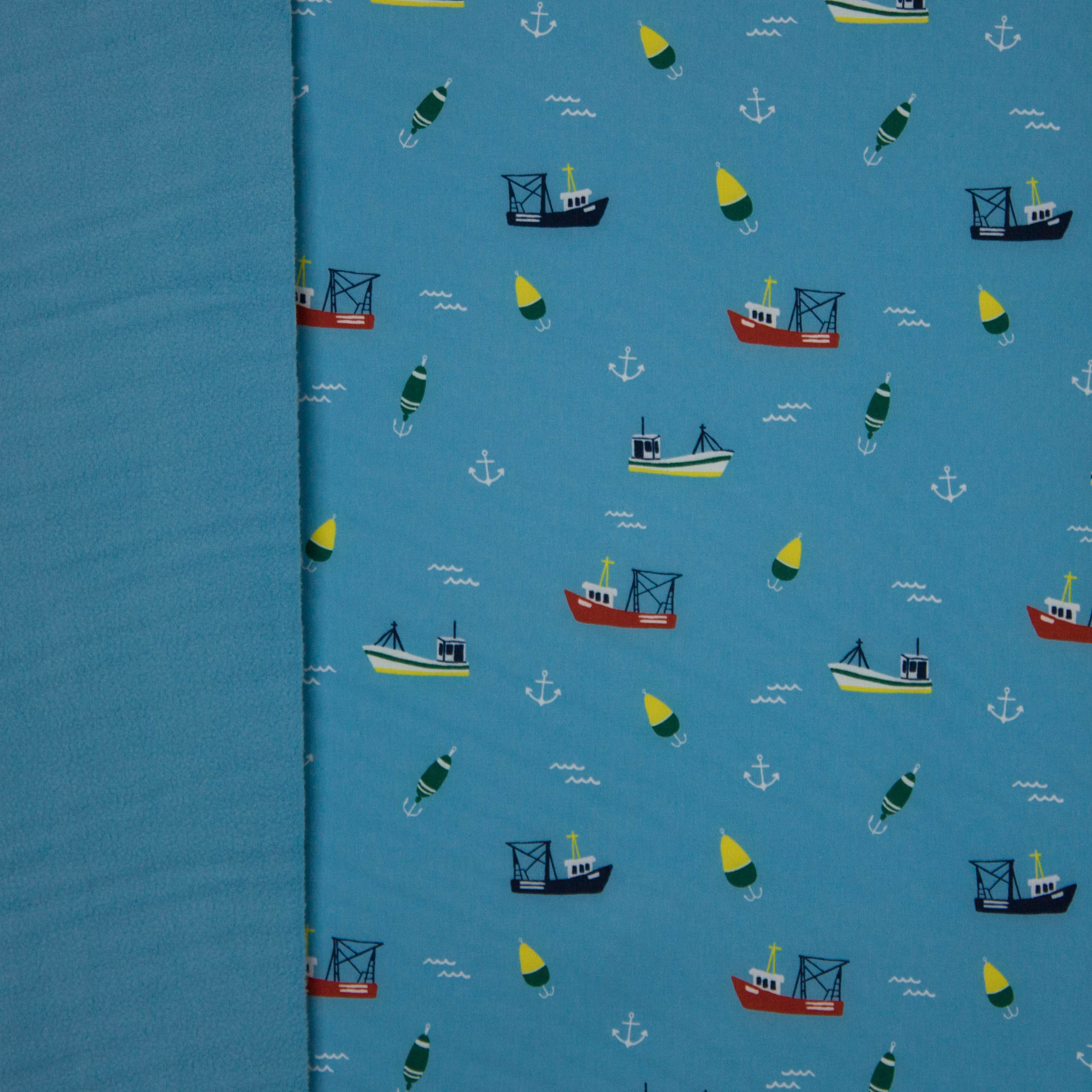 Lichtblauwe softshell met zeevaart motief met blauwe achterkant