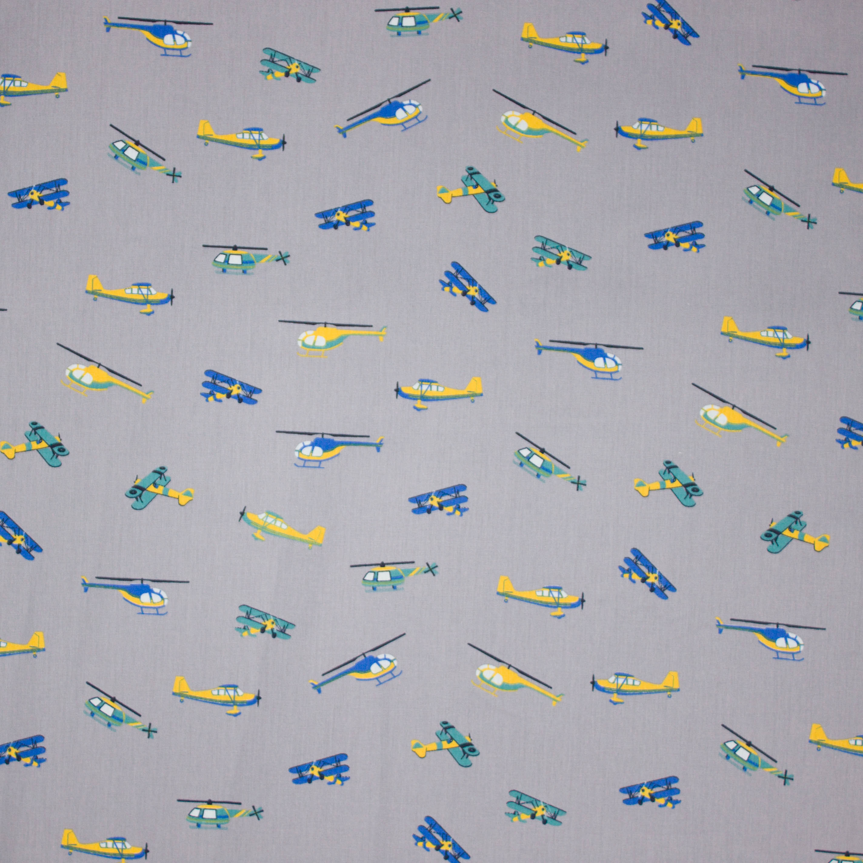 Grijs katoentje met helicopters - 'In the air' van Poppy'