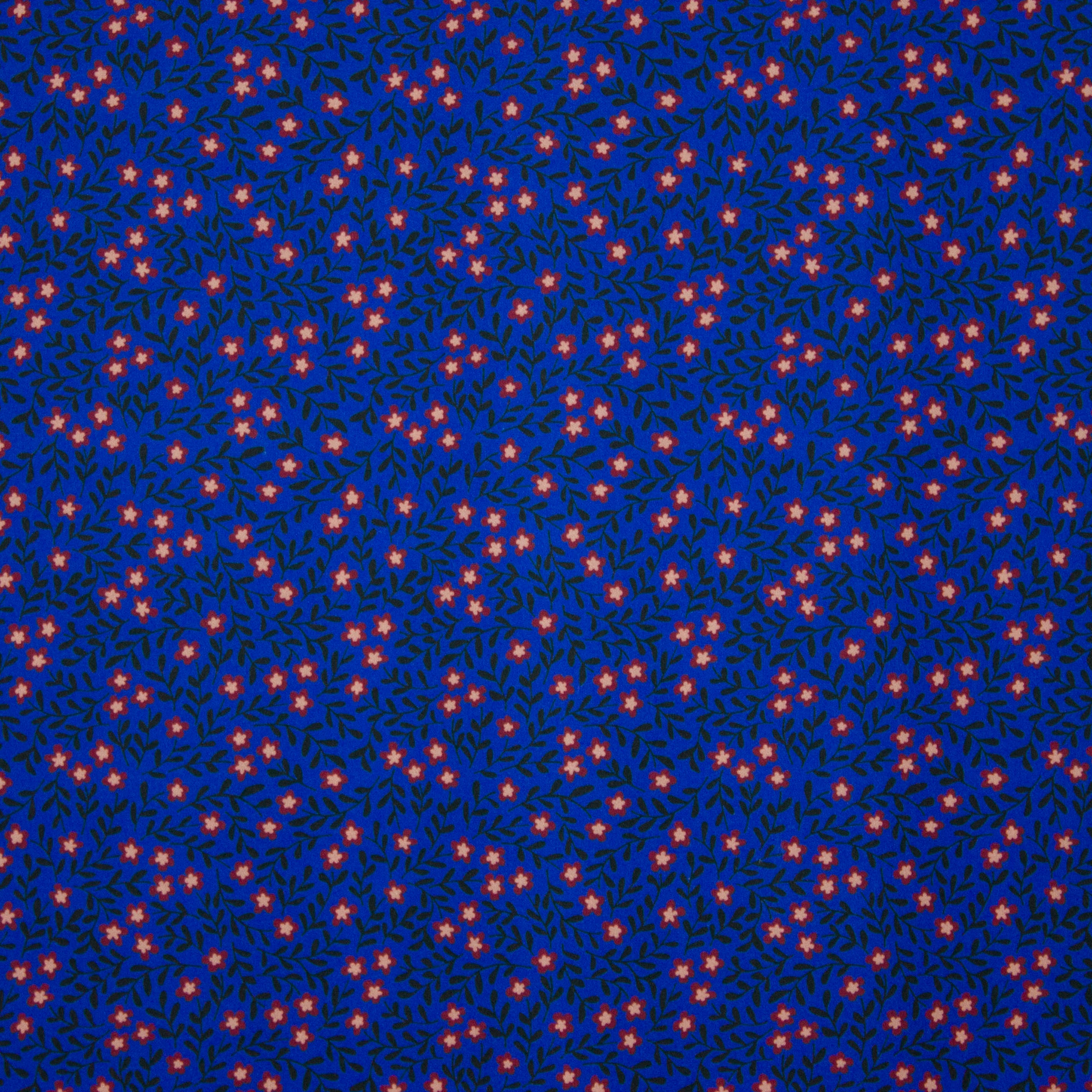 Blauwe polyester tricot met bloemetjes