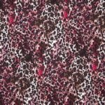 Viscose / polyamide tricot met cirkels en vlekken motief