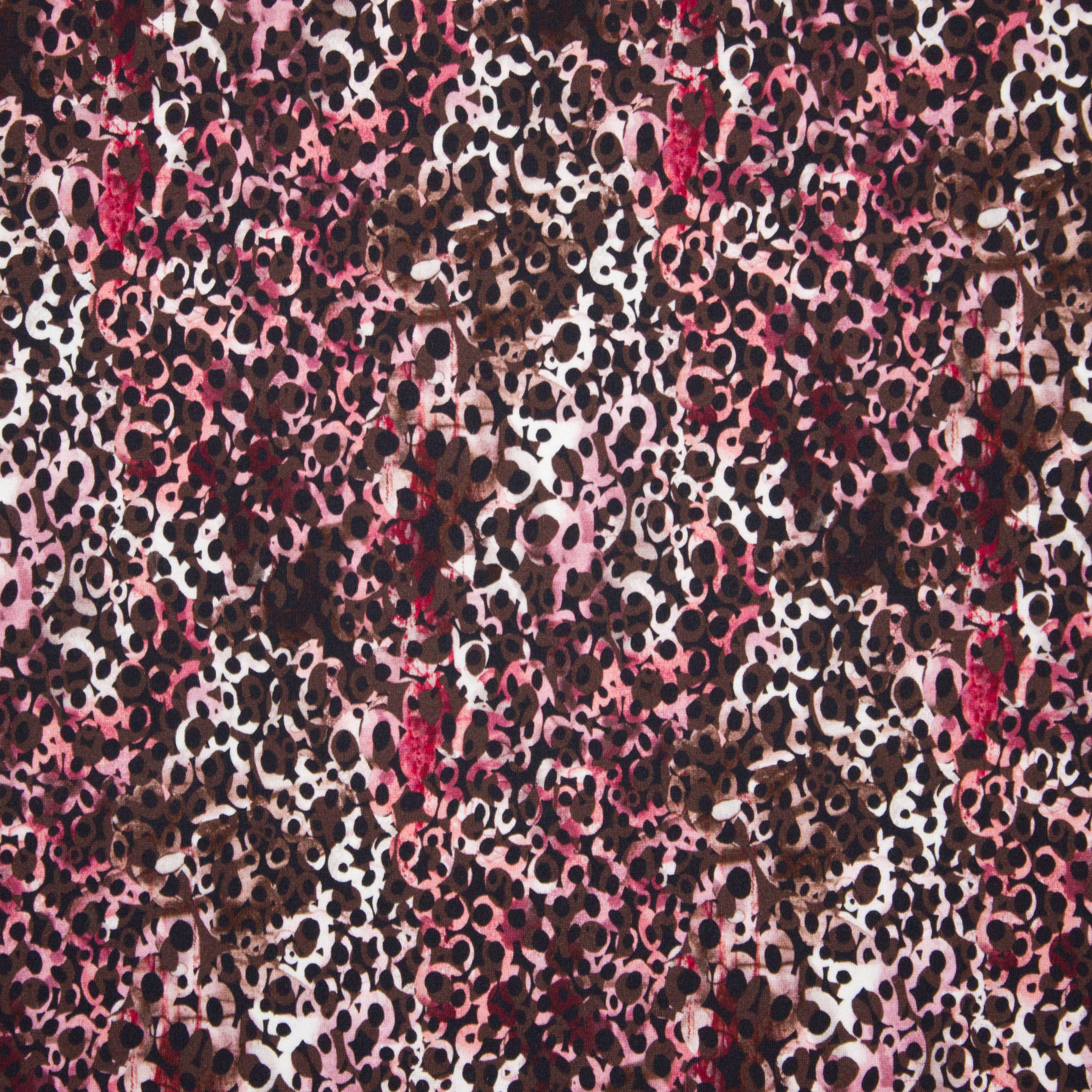 Viscose / polyamide tricot met cirkels en vlekken motief