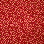 Rode katoen met kerstornamenten