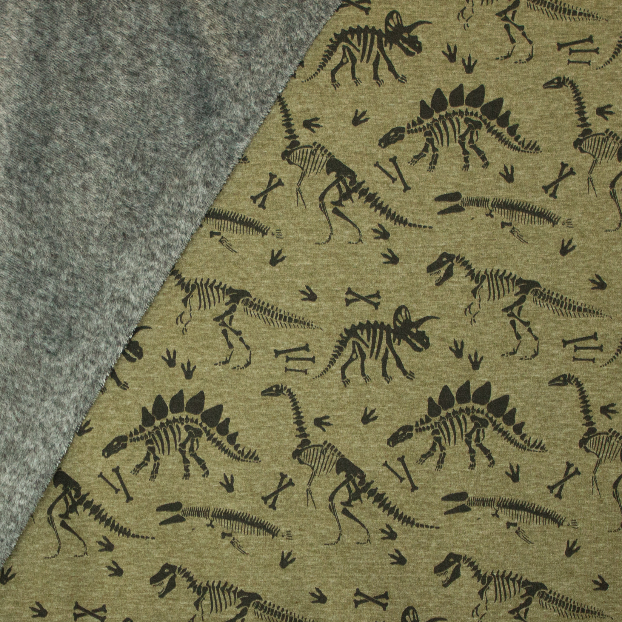 Groene gemêleerde sweaterstof met dino skeletten, achterkant grijs pelsje