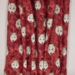 Gevlekte bordeaux tricot met wolvenkopjes van "Family Fabrics"