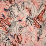 Witte viscose tricot met print van zalmroze en grijze bladeren