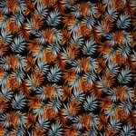 Zwarte katoen met oranje/ blauw bladermotief
