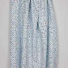 Witte tricot met blauwe en rode visjes
