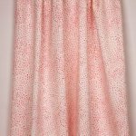 Witte tricot met rode vlekjes