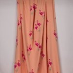 Zalmroze katoentricot met flamingo's