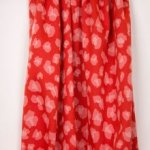 Koraalkleurige jacquardtricot met vlekkenmotief van 'Milliblu's'