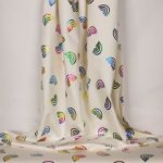 Witte tricot met glinsterende regenboogjes