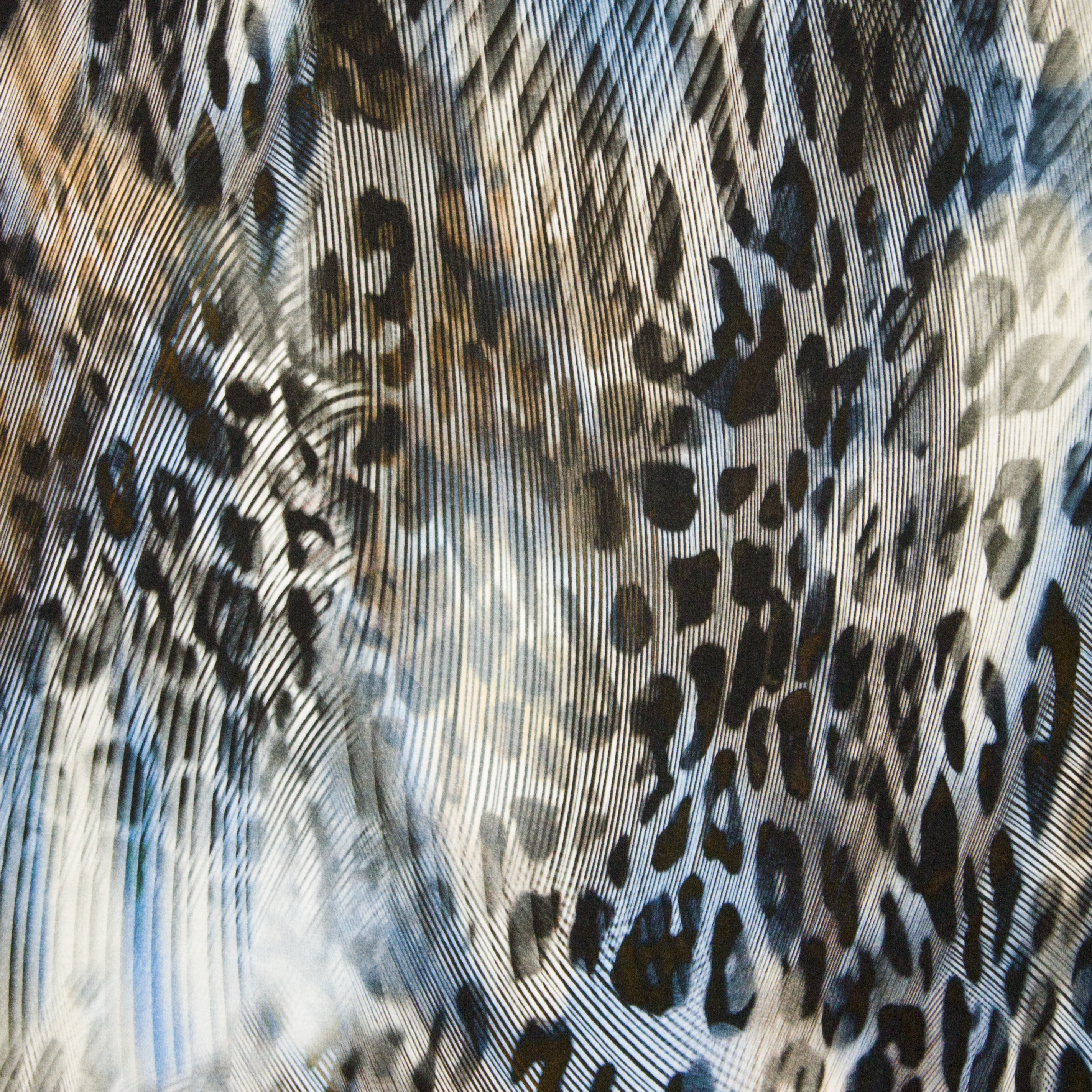 Blauwe viscosetricot met panterprint