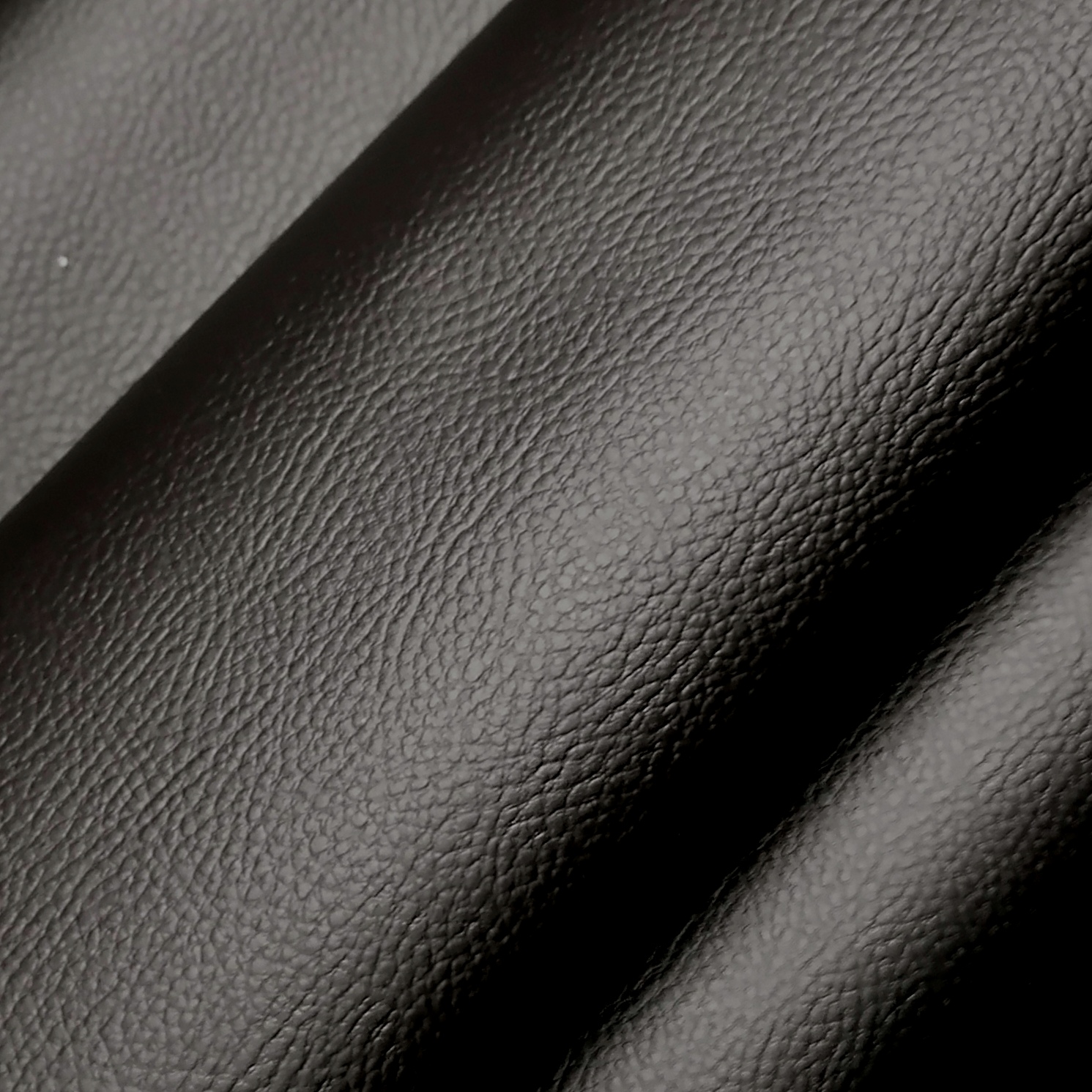 Zwart imitatieleer (PU leer) met stoffen achterzijde