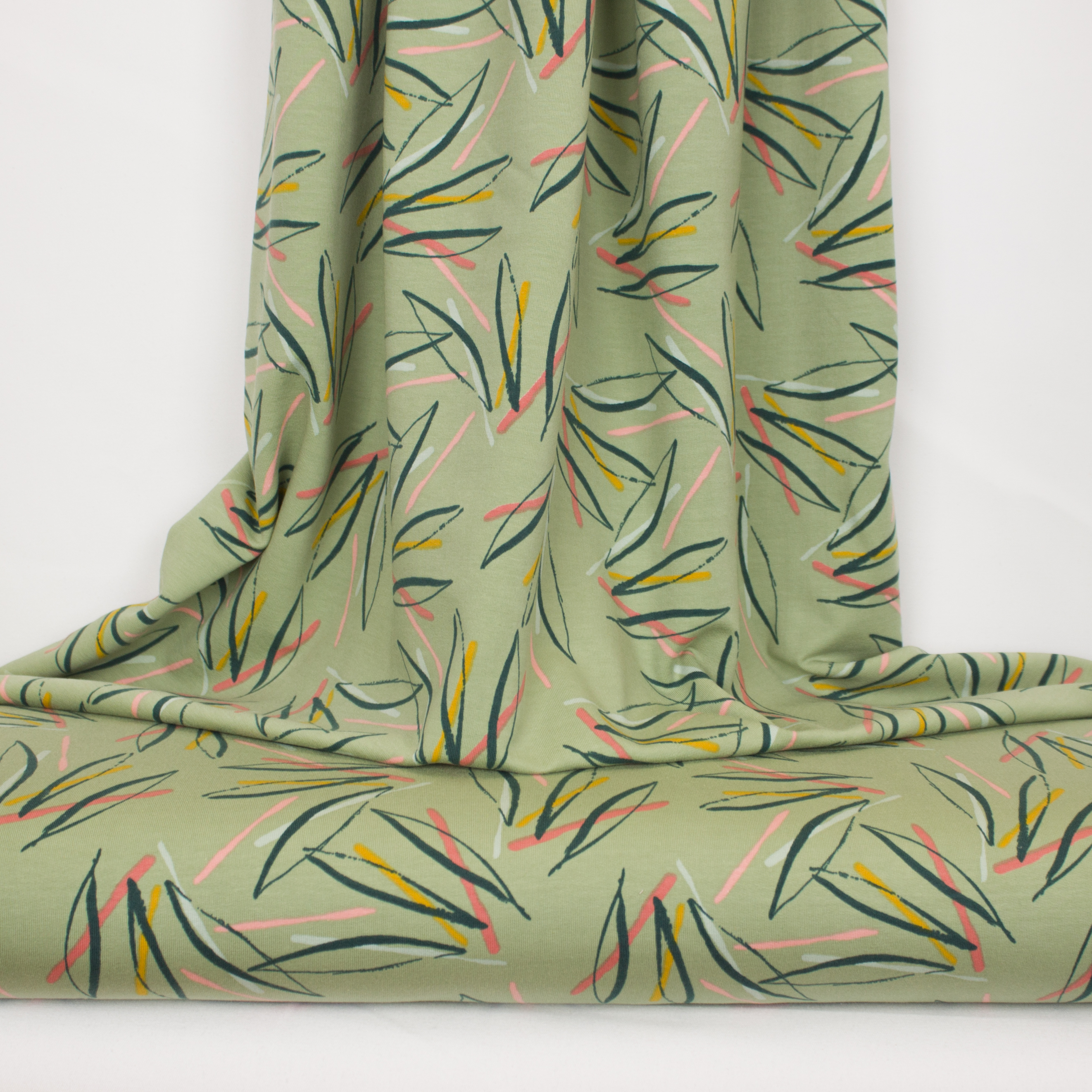 Licht groene french terry met blauwe, oranje, peach strepen van Poppy