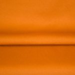 Oranje boordstof van Eva Mouton